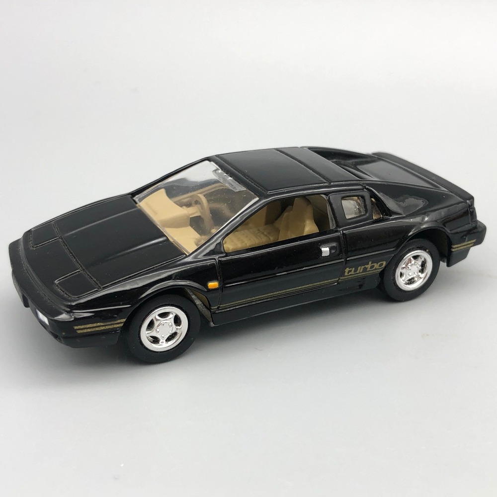 Johnny Lightning 1977 Lotus Esprit Turbo S1 Diecast Car Black Diecast 1/64 Scale